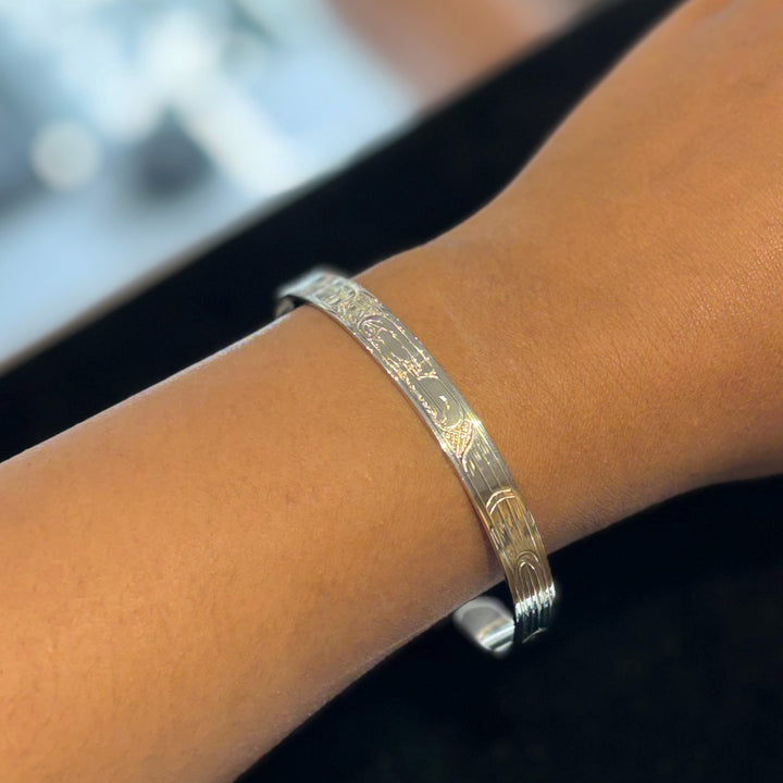 This photo shows the eagle bracelet on a female wrist.
