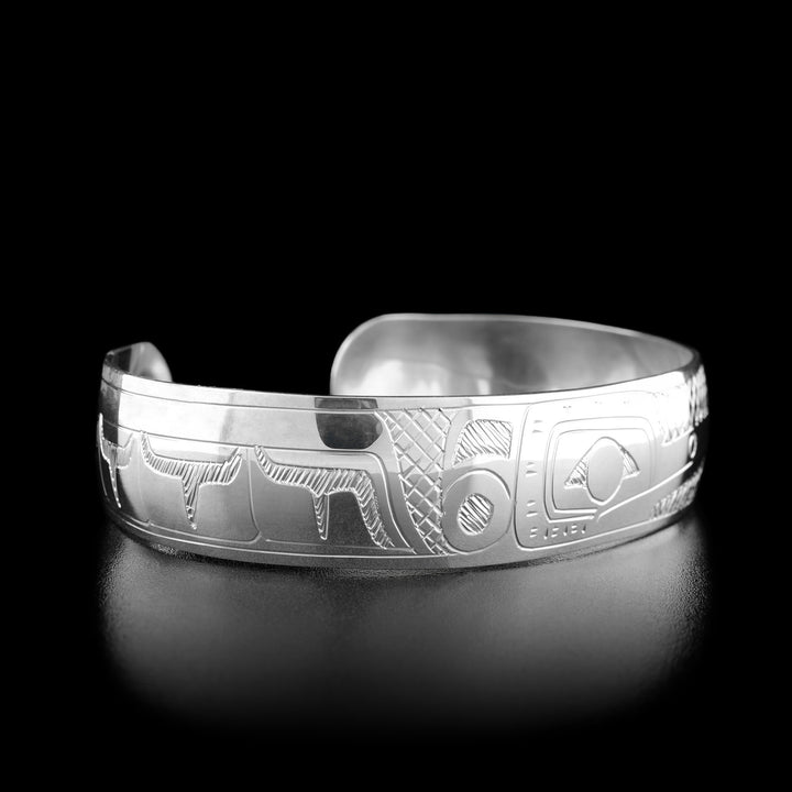 Left angle photo of the bracelet shows one of the spread wings of the hummingbird. Both sides are identical.