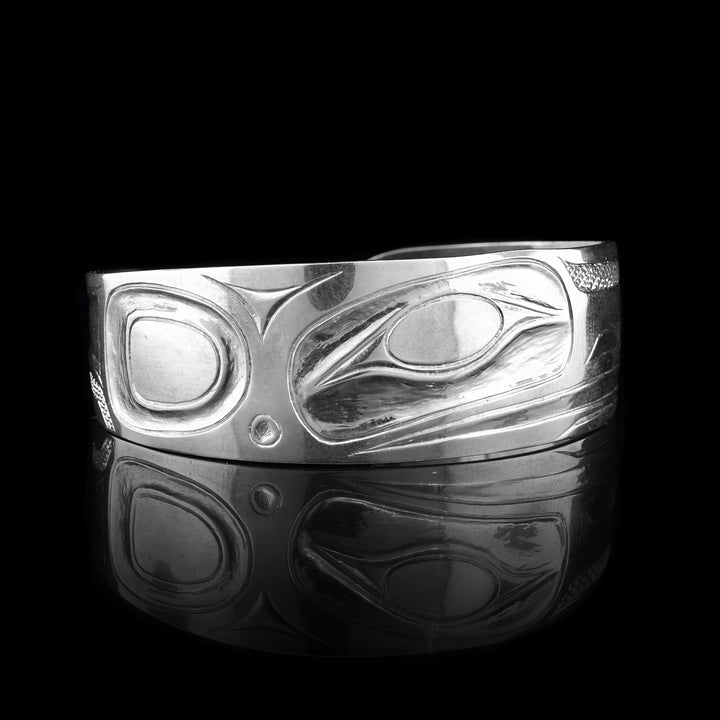 This Eagle bracelet is made from sterling silver on the are deep carvings on the surface of the band that depict the Eagle.
