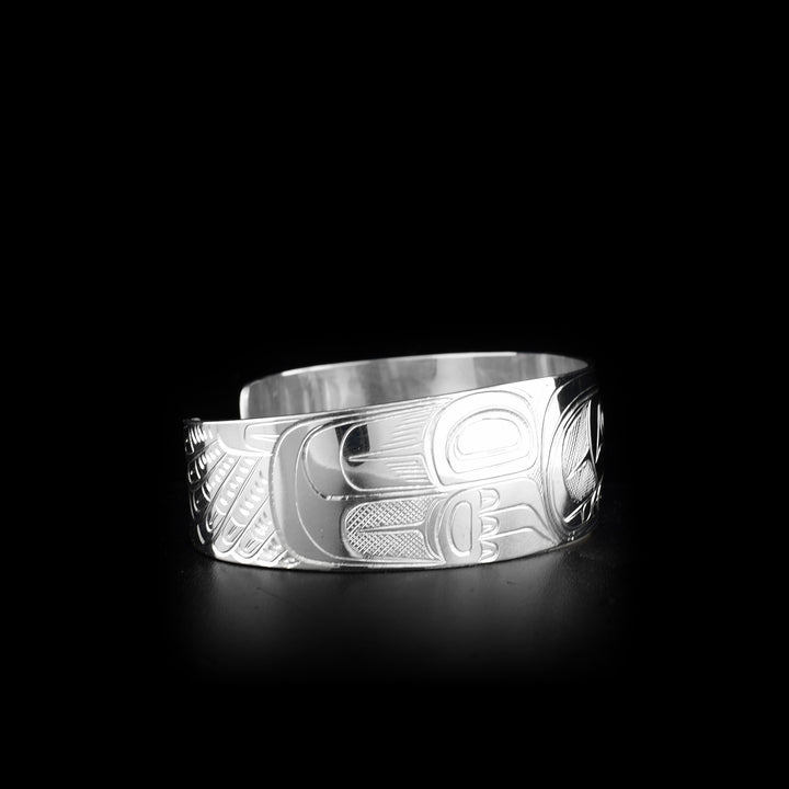 This Eagle bracelet is made from sterling silver and there is a depiction of the Eagle carved into the surface of it.