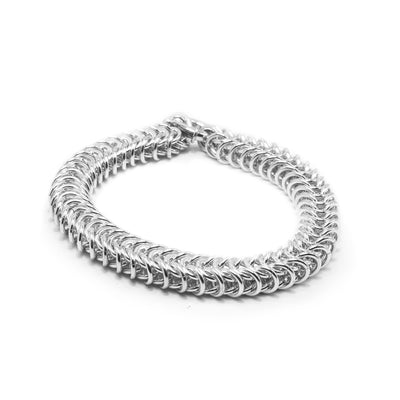 This square box chain is made from sterling silver chain links that are hand crafted together in a square fashion. The chain is wide and thick with a beautiful interlocking appearance.
