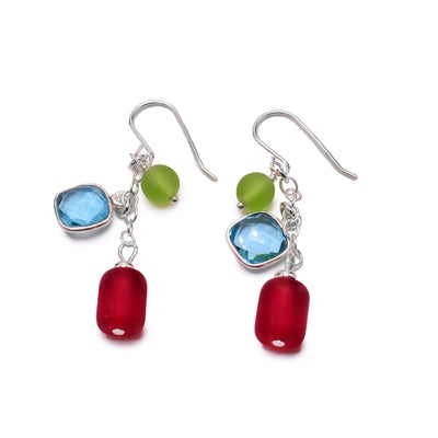 These sterling silver hook earrings have blue square, green round, and oval red beads. 
