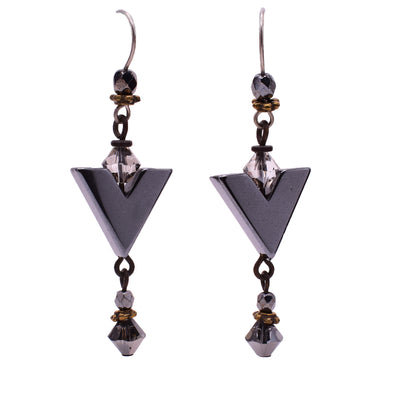 These hematine earrings are long with a arrow-shaped hematine piece in the center. They are grey, white, and brown in colour.