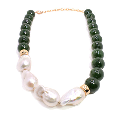 This baroque pearl necklace features 5 white baroque pearls asymmetrically aligned with two gold-filled accents on both sides. The rest of the necklace is made up of dark green BC jade beads leading to the chain at the back.