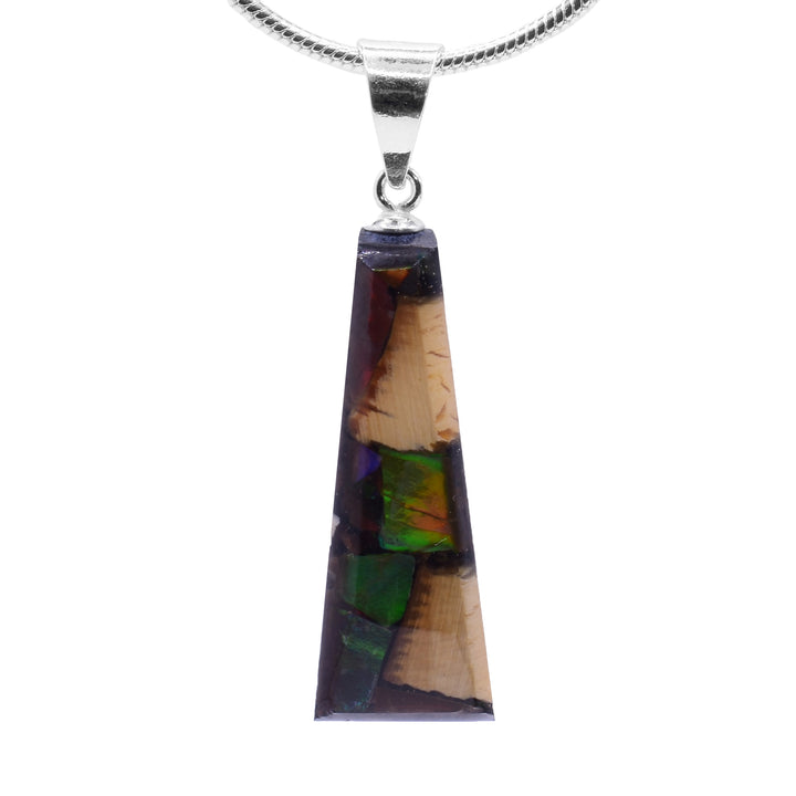 This ammolite pendant is made from fossilized mammoth ivory and ammolite gemstones. Chunks of ivory and ammolite are set in resin and make a short, tapered shape.