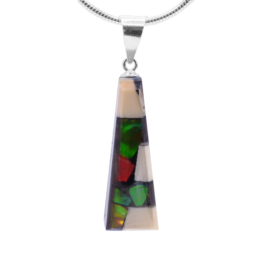 This ammolite pendant is made from fossilized mammoth ivory and ammolite gemstones. Chunks of ivory and ammolite are set in resin and make a short, tapered shape.