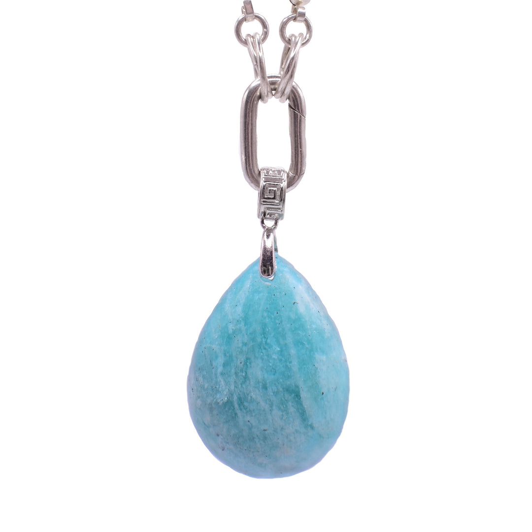 This amazonite pendant is large and teardrop shaped. It hangs from a decorative, wide hoop connected to a chain link.