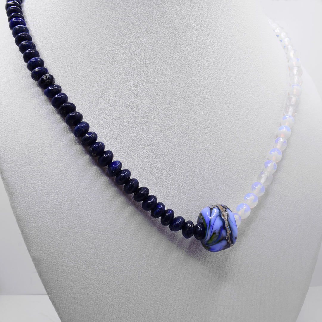 Second photo of the opalite necklace shows the necklace on a white necklace display.
