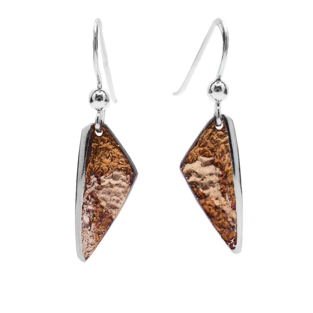 These oxidized silver earrings are in the shape of a triangle. The base is light and dark brown in colour with a sterling silver accent on the side.
