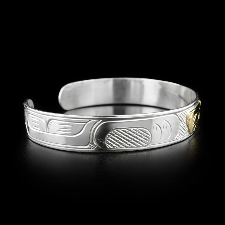 Left side photo of this bracelet depicts carvings representing the talons and more feathers belonging to the eagle.