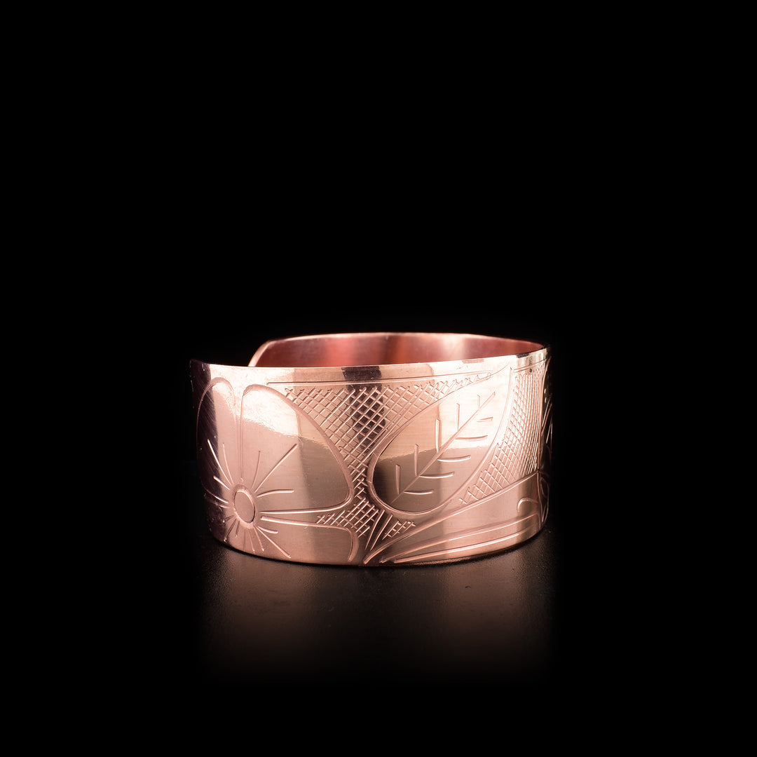 This Hummingbird bracelet is made from copper and has a thick band. There is a depiction of the Hummingbird carved into the surface of the band.