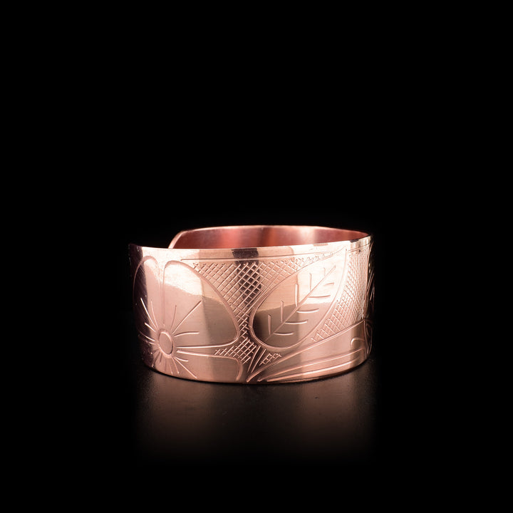 This Hummingbird bracelet is made from copper and has a thick band. There is a depiction of the Hummingbird carved into the surface of the band.