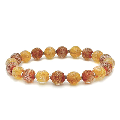 This glass bead bracelet has 20 beads connected on an elastic cord. The beads are alternating in dark and light orange colours and have bubbles on the inside of each bead.