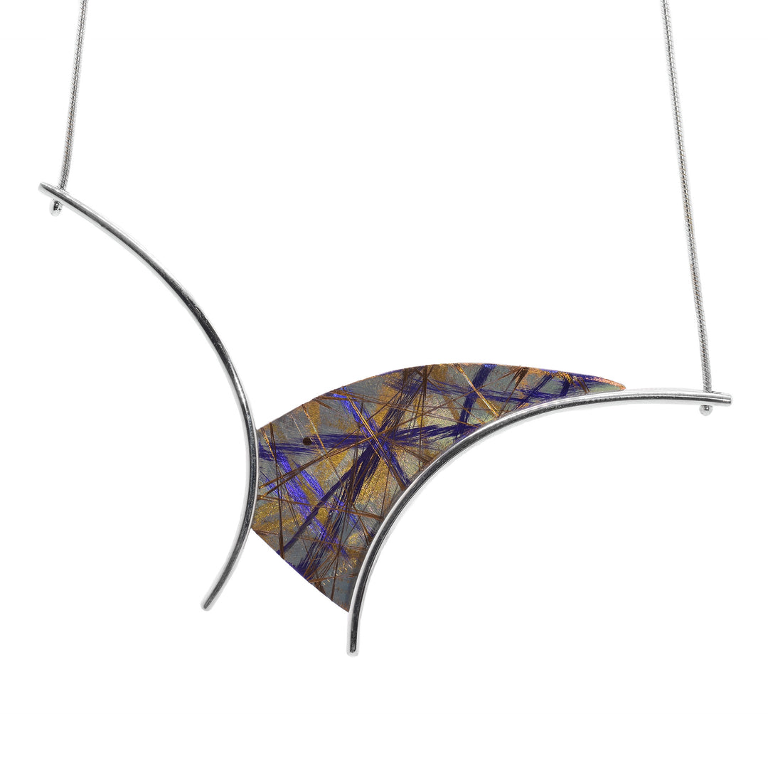 Gold Titanium Arch Necklace by Jean-Yves Nantel. Anodized gold titanium is an asymmetrical shape in the center of the pendant with two sterling silver accents on either side resembling the shape of an arch.