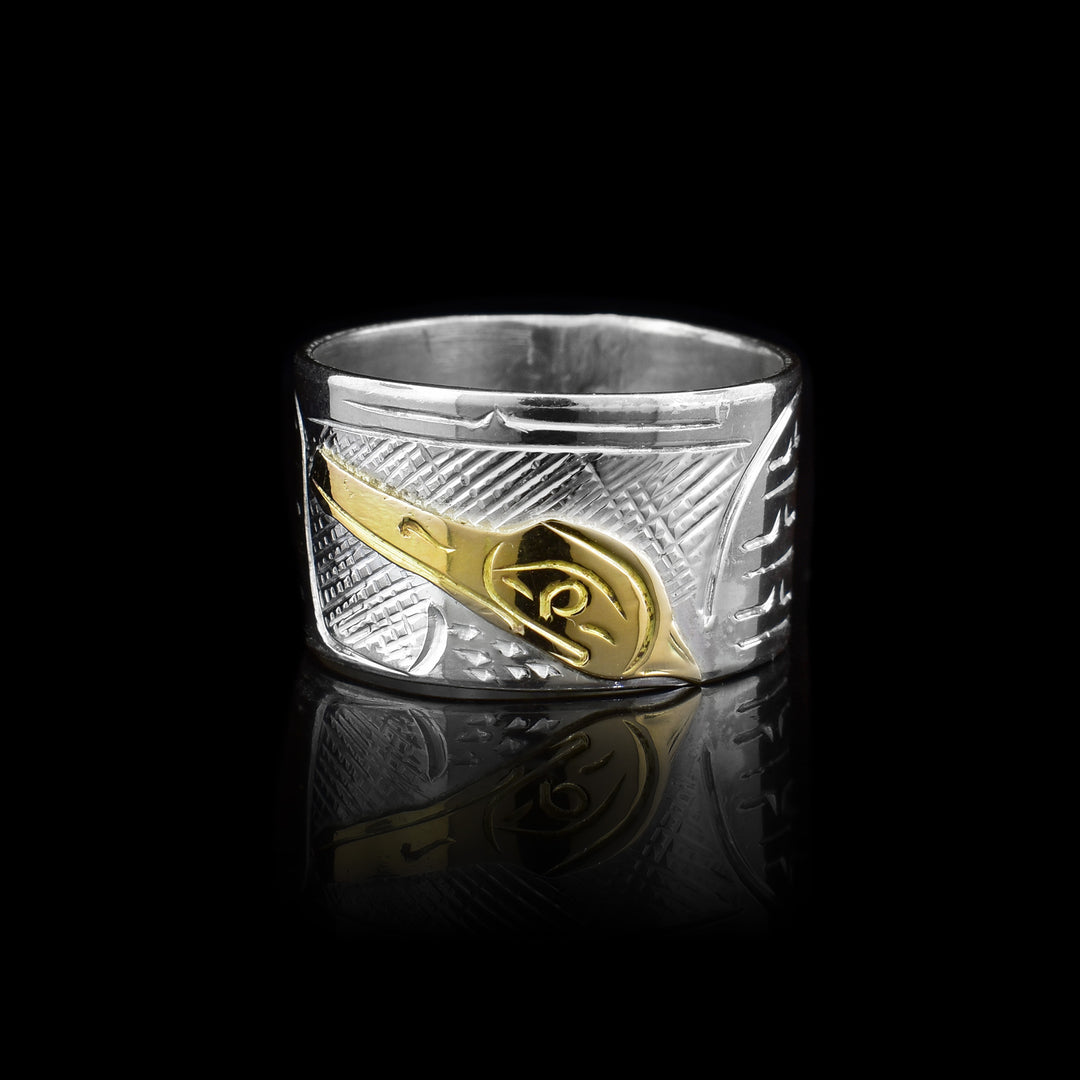 Discover the stunning silver and 14k gold Heron band ring, handcrafted by artist Graham Henry. Experience the legendary coastal design. Shop now.