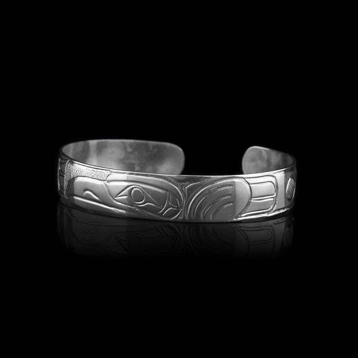 7/16" Raven Sterling Silver Bracelet the indigenous carving of the raven is delicately carved onto the cuff. 