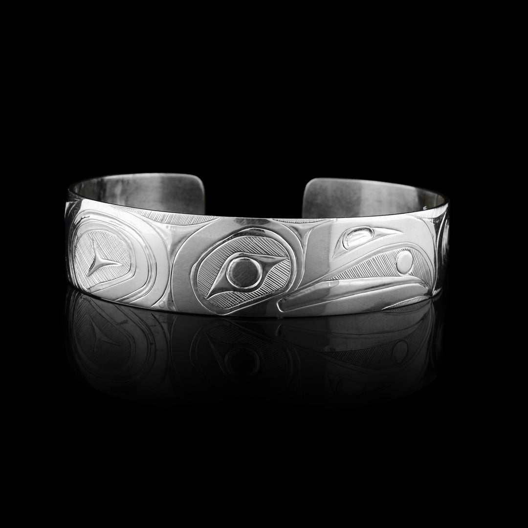 9/16" wide this Sterling Silver Raven Cuff Bracelet 