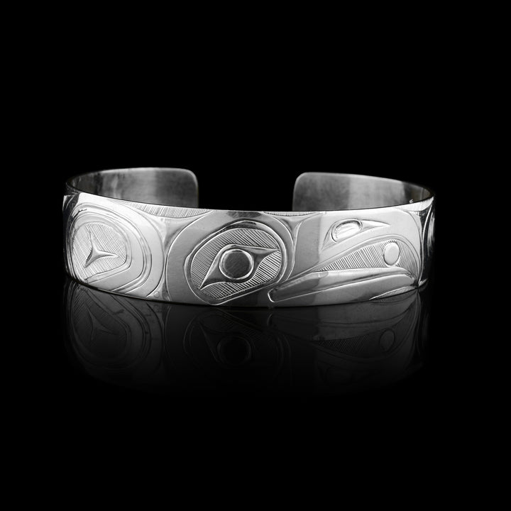 9/16" wide this Sterling Silver Raven Cuff Bracelet 