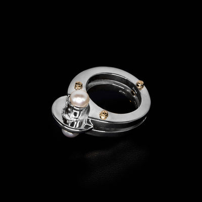 Sterling silver pearl reflection ring with 14K yellow gold bolt adornments and white freshwater pearls. Abstract design. By Ivan Dobren.