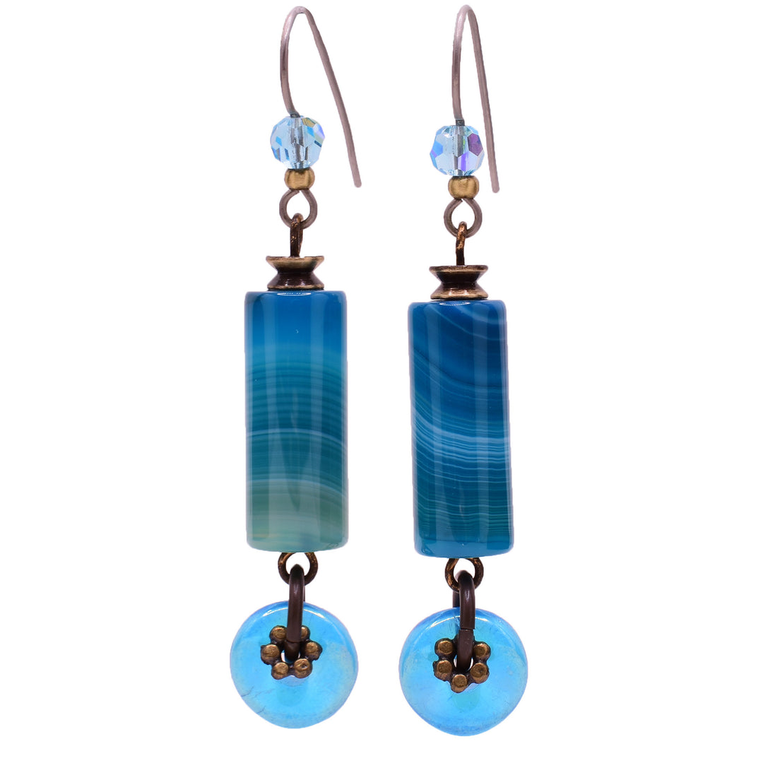 Dangle drop earrings made of Swarovski crystal, handworked brass, agate and glass. Titanium ear hooks. By Honica.