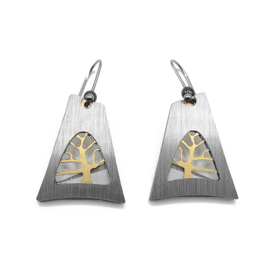 Each earring is a large, triangular frame in silver, gold tree inside. Made of brushed and anodized aluminum. Stainless steel hooks. Minimalist design.