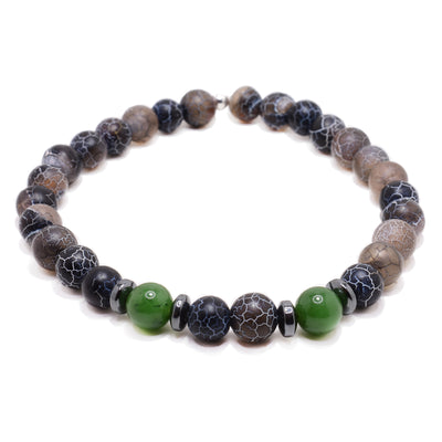 This jade bracelet has 0.25" width beads made from BC jade and cracked agate. There are hematite spacers separating the 2 jade beads from the rest of the agate beads.