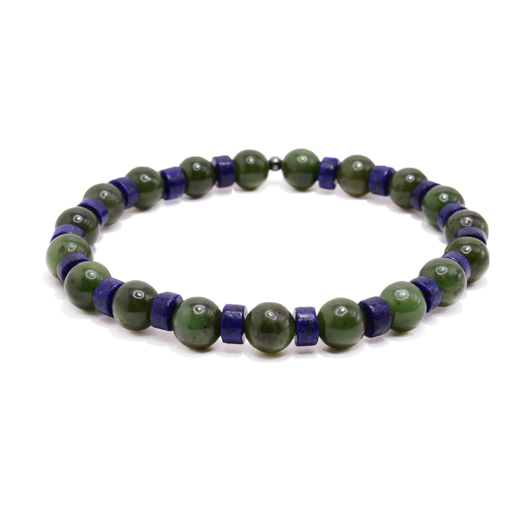 This jade bead bracelet has sphere beads made from jade with lapis lazuli spacers in between them.