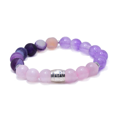 These gemstone bracelet have amethyst, pink quartz and agate sphere beads and one silver bead. There is a depiction of the Eagle that is carved into the surface of the silver bead.