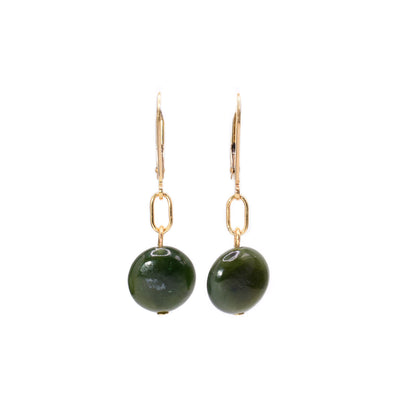 These jade earrings are made from BC jade and 14K gold filled wires. The hooks are gold and have been chain into chain which have round jade gems hanging from them.