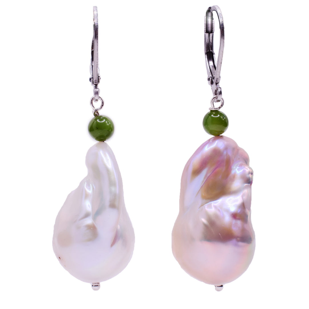 These baroque pearl earrings are made with stainless steel, BC jade and baroque pearls. The hangs are made from large, misshapen pearls with small, jade orbs above them.