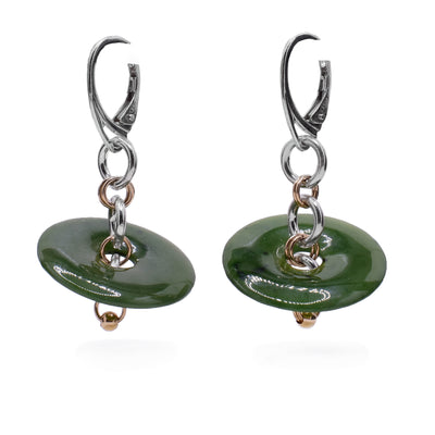 These dangle jade earrings have sterling silver and gold fill chains with BC jade discs attached to them. The discs lay horizontally.  