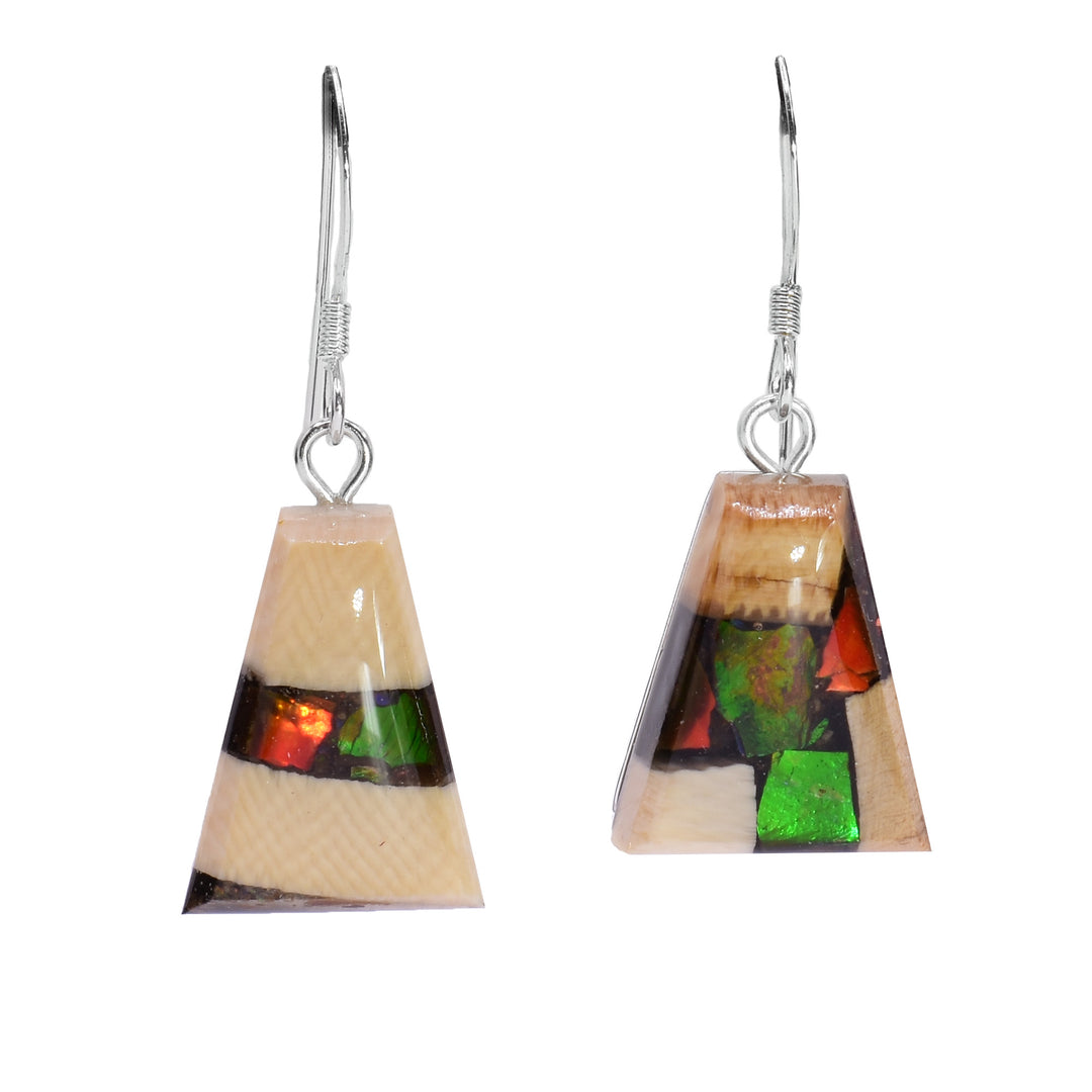 These unique ivory earrings are made from fossilized mammoth ivory, ammolite gemstones and sterling silver. The hangs are short, wide and tapered and are created by casting pieces of ammolite and mammoth ivory into the shape. The hooks are made from sterling silver.
