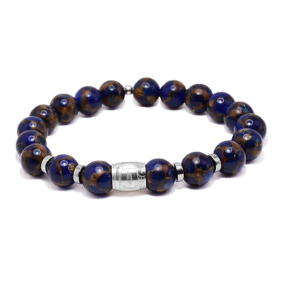 This sterling silver and sodalite gemstone bracelets has sphere beads made from the gems and flat circle hematite spacers. There is a spirit bead featured on the piece with a depiction of the Eagle carved into it.