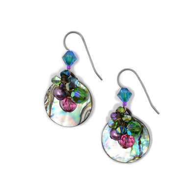 Abalone circles dangle from titanium hooks with a cluster of beads in freshwater pearl, dyed agate, glass, Swarovski crystal and amethyst above.