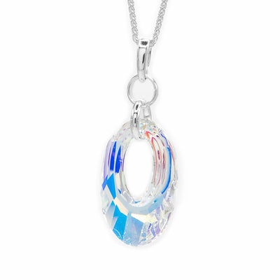 Aurora borealis helios-shaped Swarovski crystal pendant with sterling silver bail. By artist Debra Nelson.