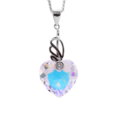 Sterling silver heart shaped aurora borealis Swarovski crystal pendant by artist Debra Nelson.