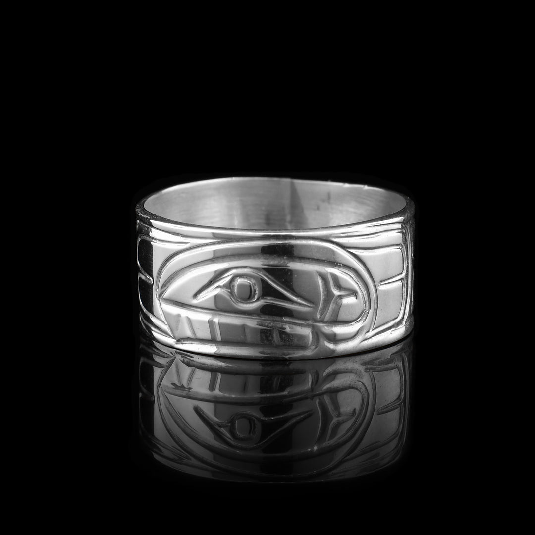 This sterling silver Orca band ring has a large band with the Orca carved into it.