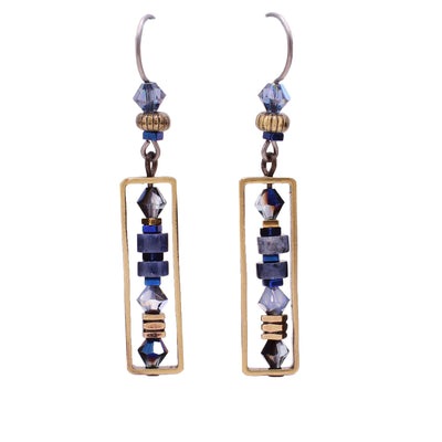 Dainty blue dangle earrings made of Austrian crystal, dumortierite and glass. Titanium ear hooks. By Honica.