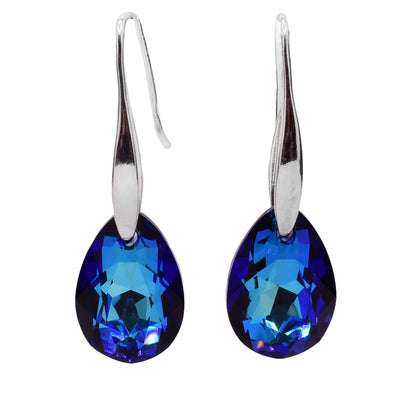 These Swarovski crystal earrings feature pear shaped bermuda blue Swarovski crystals with sterling silver hooks.