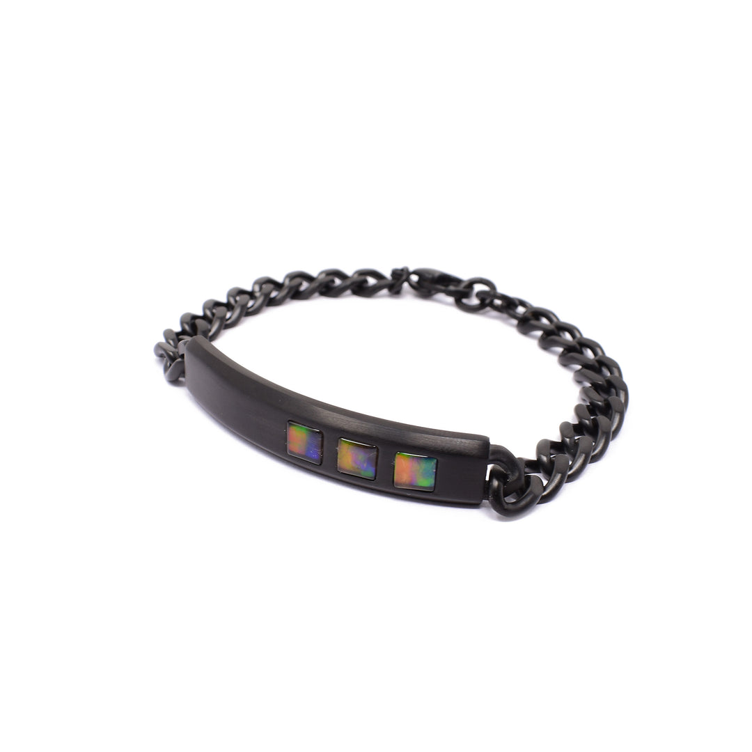 Side-view of black titanium ammolite bracelet.