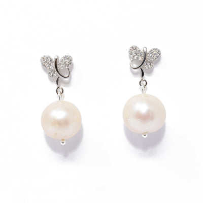 On both earrings, there is a butterfly design with cubic zirconia for stud part. Round, cream-coloured pearl dangles below. All metal is sterling silver.