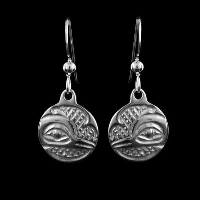 These sterling silver dangle Hummingbird earrings have small, circle hangs dangling from long hooks. The hangs depict the side profile of the head of the Hummingbird with cross hatching designs in the background.