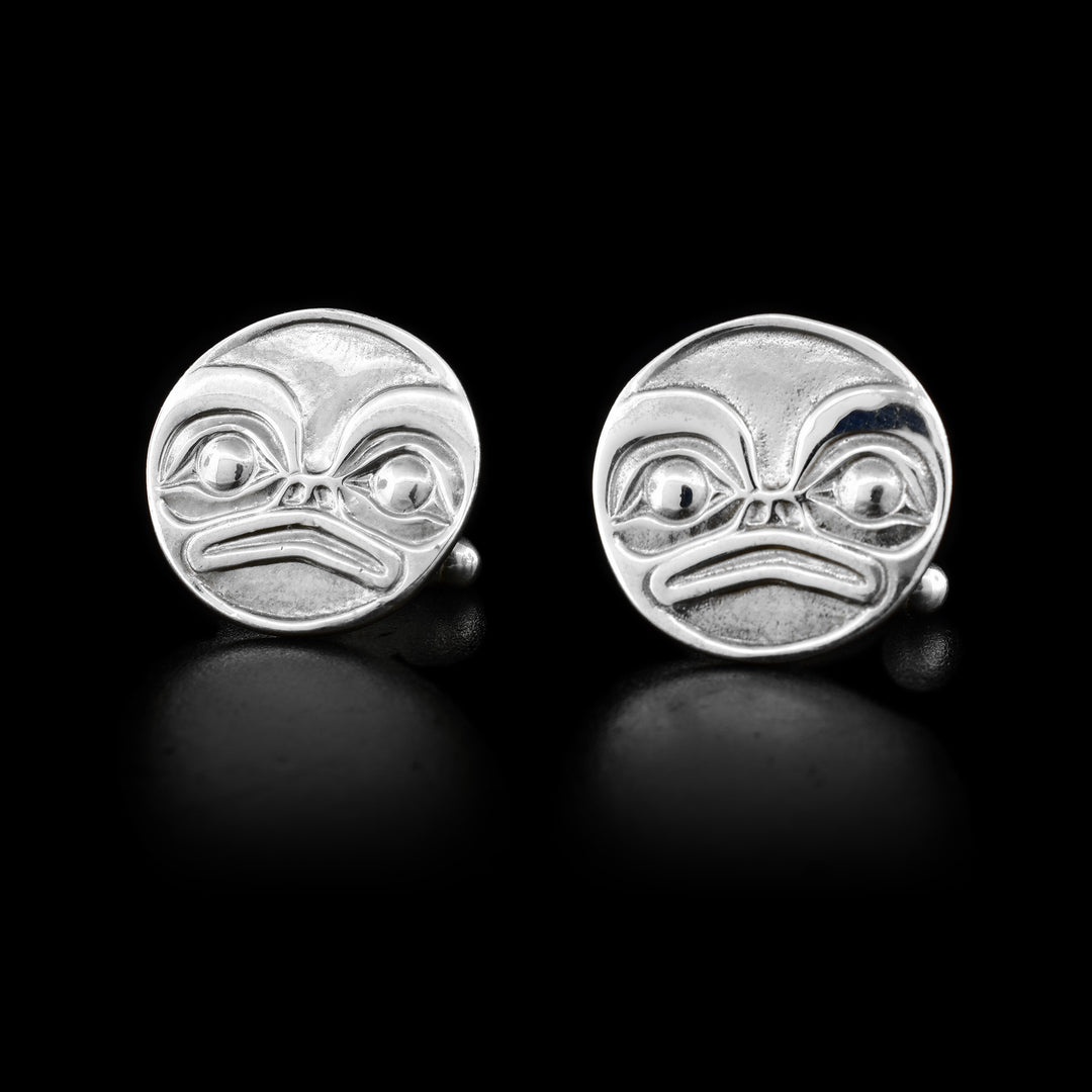 These sterling silver cufflinks are circle shaped and have a depiction of the Frog on them.