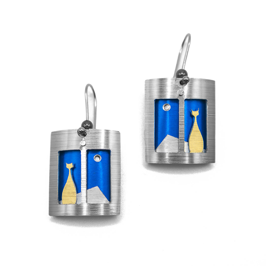 Brushed and anodized aluminum cat in blue window earrings by JR Franco. Minimalist design.
