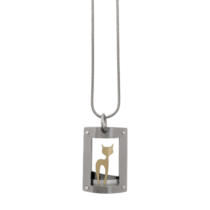 This cat necklace with pendant has a curved, grey frame with gold-colour cat silhouette inside. Side-view of cat with head turned to side so both ears are visible. Minimalist design. By JR Franco. Stainless steel snake chain included.