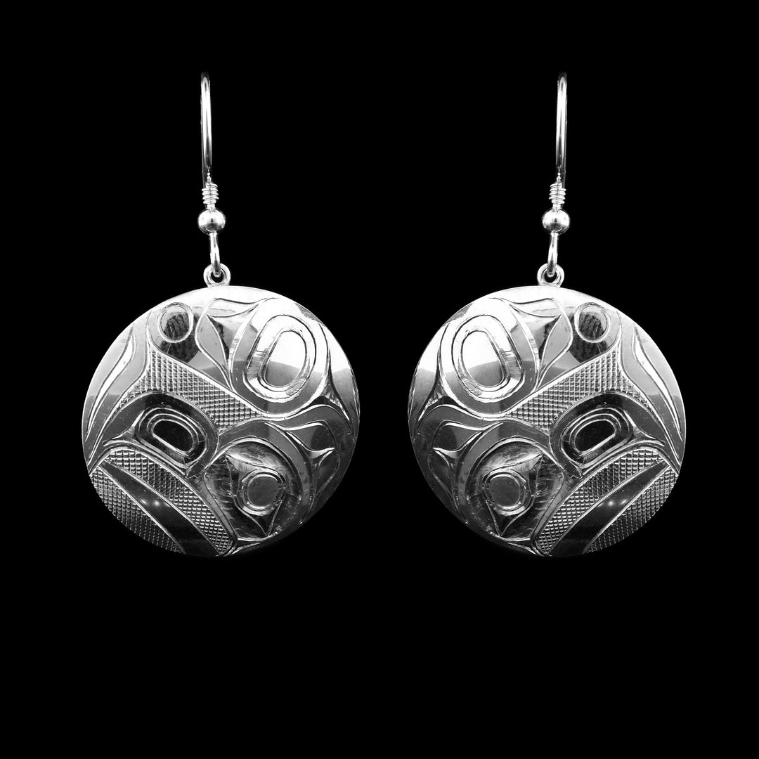 Sterling Silver Circular Raven Earrings, The legend of the raven is carved into the circular hangs of the earrings.