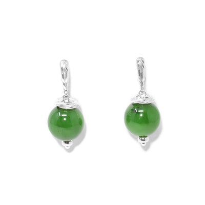 Round BC jade beads, 0.5” in diameter, hang from silver lever-back hooks. Silver ring adornments on and under beads. All metal is sterling silver.