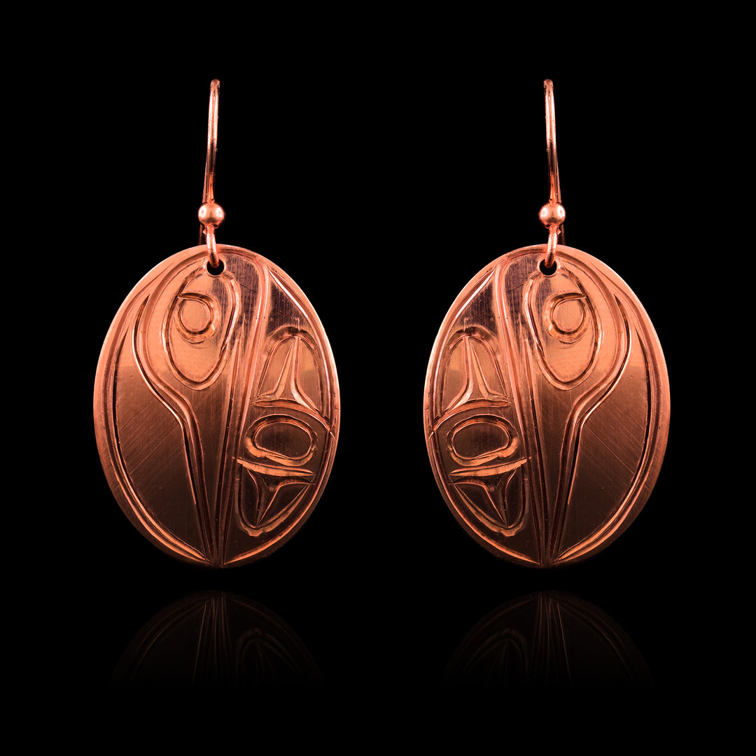 Copper Oval Hummingbird Earrings, Indigenous legend of the Hummingbird is carved onto the surface of the oval copper dangling earrings.