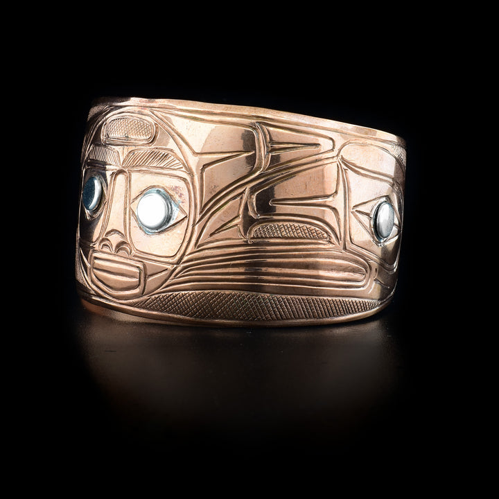 Left side with raven, sterling silver in eye.