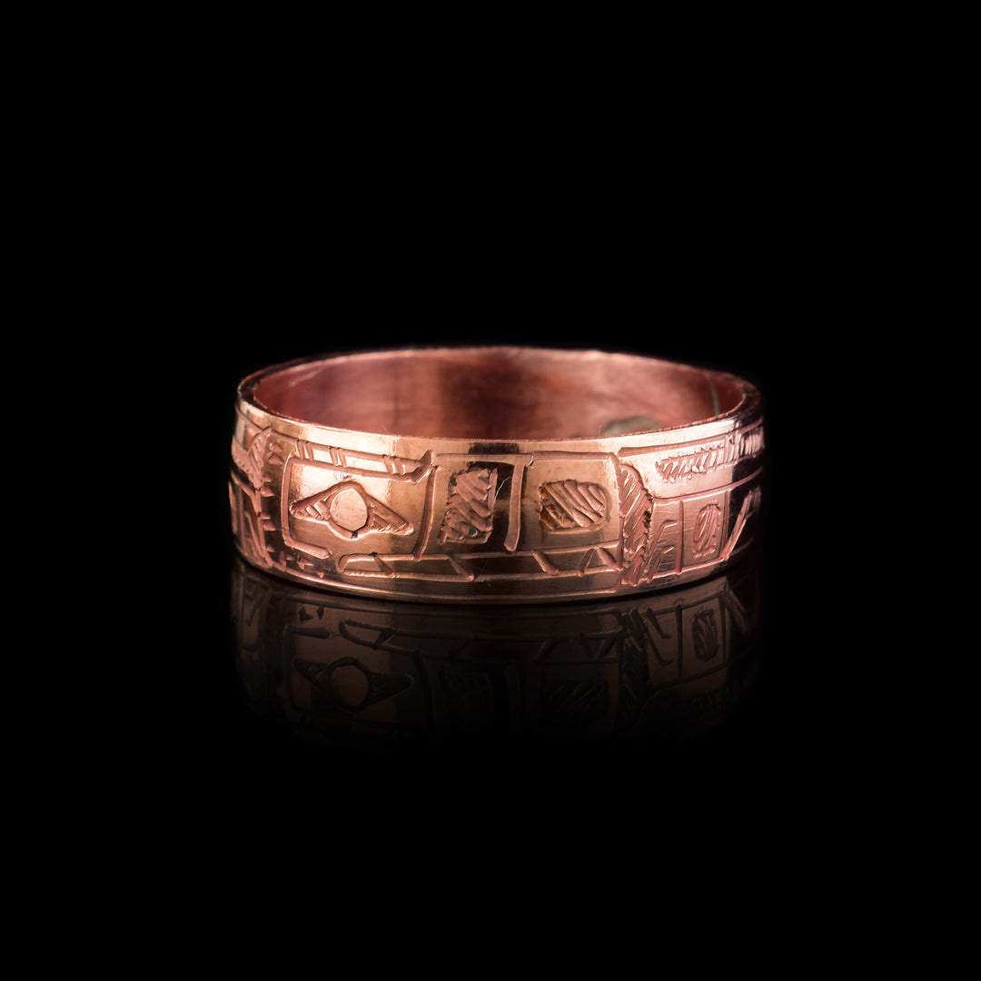 This Copper Wolf Band Ring is a quarter inch thick with the carving of the wolf legend across the band.